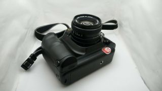 Canon T90 SLR 35mm Film Camera with 50mm f1.  8 FD Lens - - Film 2