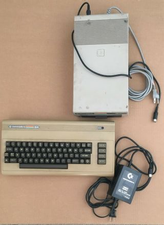 Commodore 64 W/ Matching Disk Drive Model 1541,  Power Supply,  And Link Cable