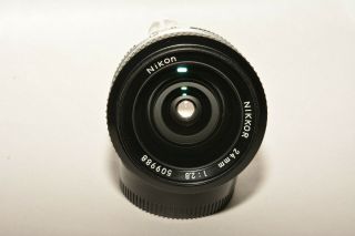 Nikon Nikkor 24mm,  F2.  8 Ai Wide Angle Lens With Caps