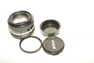 Nikon Nikkor 50mm,  F1.  4 Ai Lens With Caps & Nikon Filter