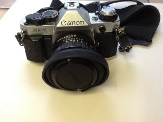 Canon AE - 1 Program 35mm Camera with FD 50mm 1:1.  8 Lens 2