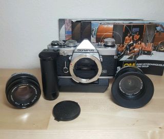 Olympus Om - 1 Camera F.  Zuiko Auto - S 1:1.  8 50mm,  Mc Auto - W 1:2.  8 28mm