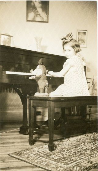 Vintage 1937 B/w Photo Of A Young Girl & Her Mickey Mouse Doll Playing The Piano