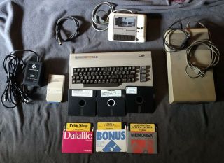 Commodore 64 Computer W/ 1541 Floppy Drive,  Datacasette,  Modem,  Software & Cords