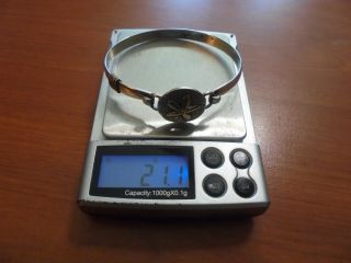 Vtg sterling silver and 14k gold sand dollar hinged bangle bracelet 21.  1 grams 7