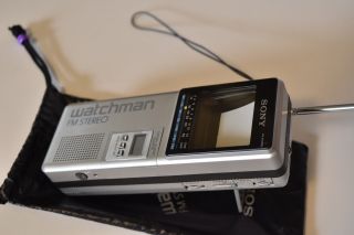 Vintage Sony Watchman mini TV FD - 3A plus FM Stereo,  AC adapter,  cable connect 2