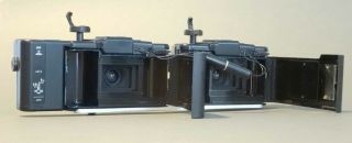 Two Olympus XA2 35mm cameras with one A11 flash OR stereo 3D conversion 5