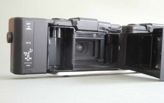 Two Olympus XA2 35mm cameras with one A11 flash OR stereo 3D conversion 6