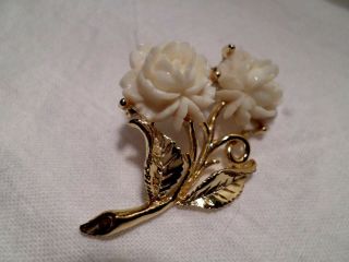 Vintage Gold Tone Pin Brooch With White Color Carved Flowers