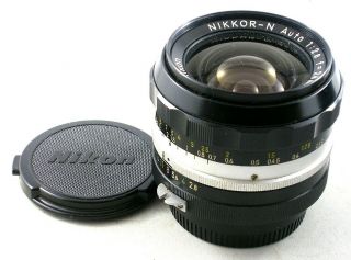 Fine Nikkor - N Auto 24mm 1:2.  8 Wide Angle Lens W/caps And Case