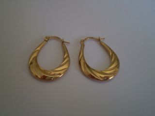 Vintage Solid 9.  Ct Yellow Gold Hoops Ladies Earrings.