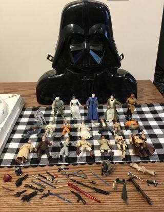 Vintage Star Wars Figures,  Weapons,  And Darth Vader Case.