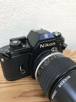 Nikon Em Camera With Nikkor 135mm F2.  8 Lens