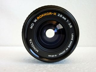 MINOLTA MD W.  ROKKOR - X 28mm f/2.  8 LENS & HOOD - ONE OWNER - NEAR 6