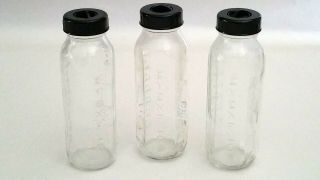 3 Vintage Evenflo Embossed Glass Baby Bottles Black Caps Rings 8 Oz 240 Cc Usa