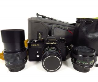 Minolta Xe - 7 35mm Slr Film Camera,  50mm F/1.  7 135mm F/2.  8 28mm F/2 Lens Bundle