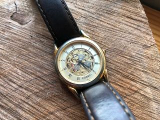Vintage Fossil Skeleton Ladies Mens Watch,  Gold Tone,  Roman Numerals Battery