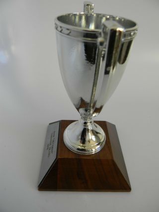 Vintage 1976 Trophy Metal Cup on a Wood Base,  6.  25” 4