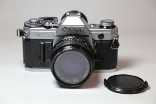 Canon Ae - 1 35mm Slr Film Camera With Canon Fd 50mm 1:1.  4 Lens