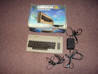 Commodore 64 Computer With Power Converter Monitor Cable & Box