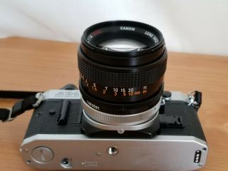 Canon AE - 1 Program 35mm SLR Film Camera w/FD 50mm Lens 1:1.  4 S.  S.  C 55mm Sky A 3