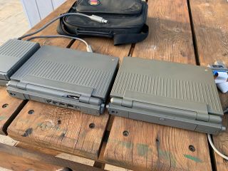 Apple Powerbook 100 x2,  2 external floppy drives,  Apple carry bag,  more 4