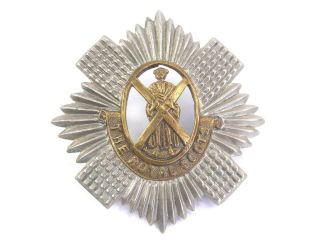 Vintage White Metal & Brass British Military Cap Badge The Royal Scots Regiment