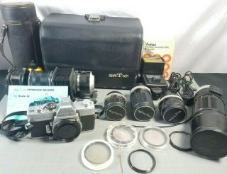 Bundle Of Minolta Camera Srt101 And 5 Lenses Filters Flash Light And Case