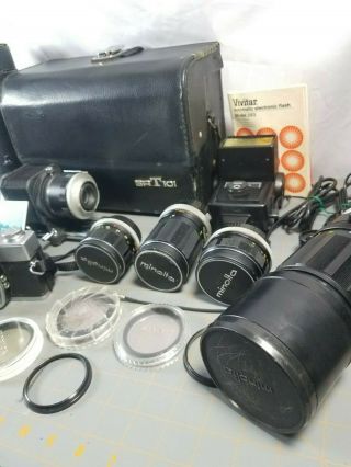 Bundle of Minolta Camera SRT101 and 5 Lenses Filters Flash Light and Case 2