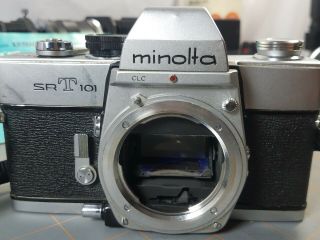 Bundle of Minolta Camera SRT101 and 5 Lenses Filters Flash Light and Case 3