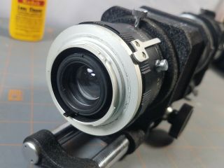 Bundle of Minolta Camera SRT101 and 5 Lenses Filters Flash Light and Case 8