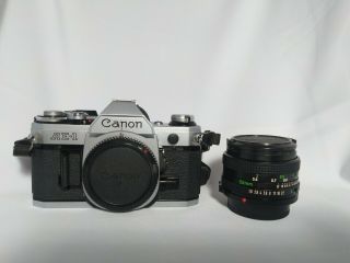 Canon Ae - 1 35mm Film Camera,  Fd 50mm F/1.  8 Lens,  Strap,  Caps