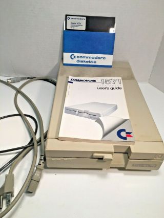 Commodore 1571 Disk Drive Complete With User Guide For Commodore 128 Computer