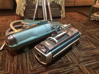 2 Vintage Electrolux Canister Vacuum Cleaners Model G & 1205 W/attachments