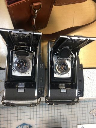 Polaroid Land Camera 110a,  2 Cameras,  Case,  Flash,  Manuals Accessories