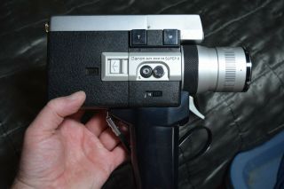 Canon Auto Zoom 518 8 Camera With Case And One Package Of Film.