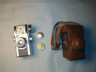 Steky Model Iii 16mm Miniature Camera With Leather Case And Yellow Filter