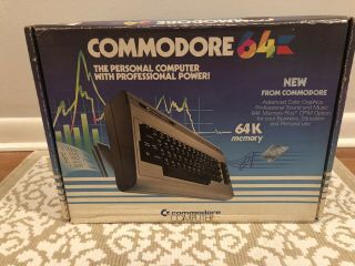 Commodore 64 Computer And With Power Supply And Box