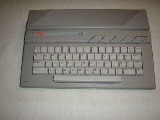 Atari 65 Xe / Case And Keyboard,  Metal Shield And Box