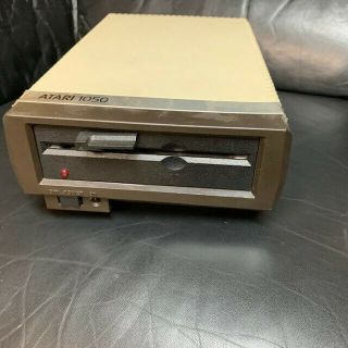 Vintage Atari 1050 Disk Drive with Disks 8 Bit Computer 400 800 2