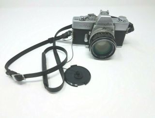 Minolta Srt 101 35mm Camera W/case,  Lens Cover,  And Strap