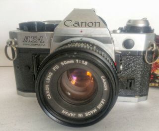 Canon AE - 1 Program 35MM SLR camera with Canon Lens FD 50mm 1:8,  vintage strap 2