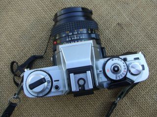 Minolta XG - M 35mm SLR Camera with 50mm Minolta MD lens,  with battery adapter 2