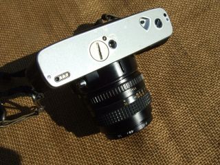 Minolta XG - M 35mm SLR Camera with 50mm Minolta MD lens,  with battery adapter 3