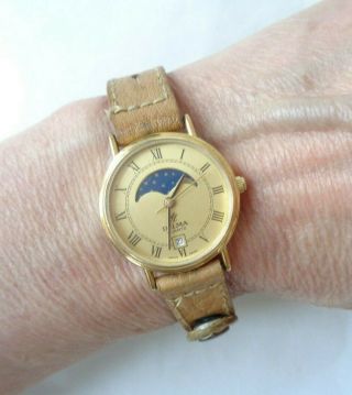 Vintage Delma Swiss Made Quartz Ladies Gold Tone Moonphase Watch Battery