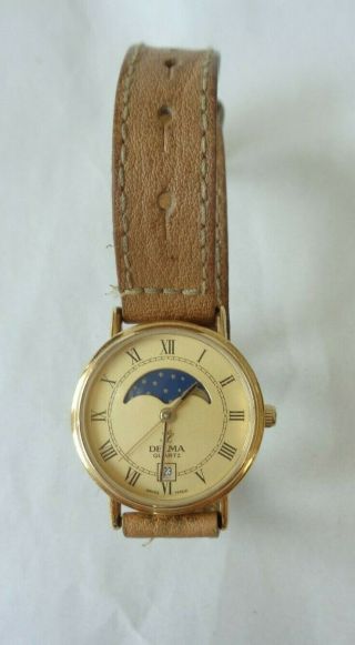 Vintage Delma Swiss Made Quartz Ladies Gold Tone Moonphase Watch battery 2
