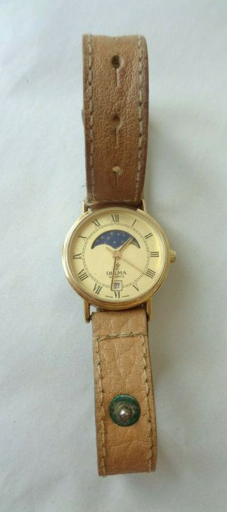 Vintage Delma Swiss Made Quartz Ladies Gold Tone Moonphase Watch battery 6