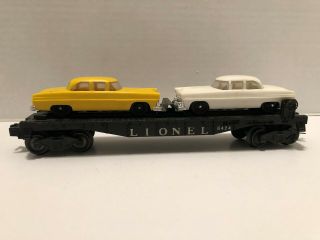 Vintage Lionel Postwar 6424 Flat Car With Yellow & White Car Load,  (on Right)