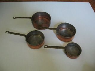 Vintage Copper Set Of 4 Measuring Pans Cups With Brass Handles