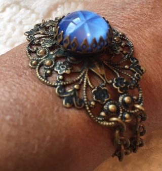 Vintage Art Deco Style Brass Filigree Bracelet Blue Glass Star Sapphire Cabochon